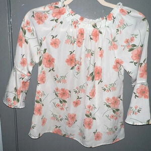 COPPER key size medium white with coral floral pattern. Long bell sleeves.